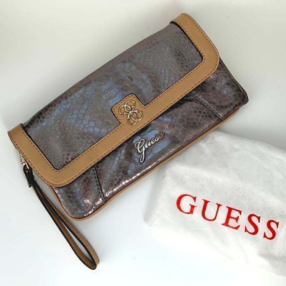 🤎Guess Clutch with dust bag